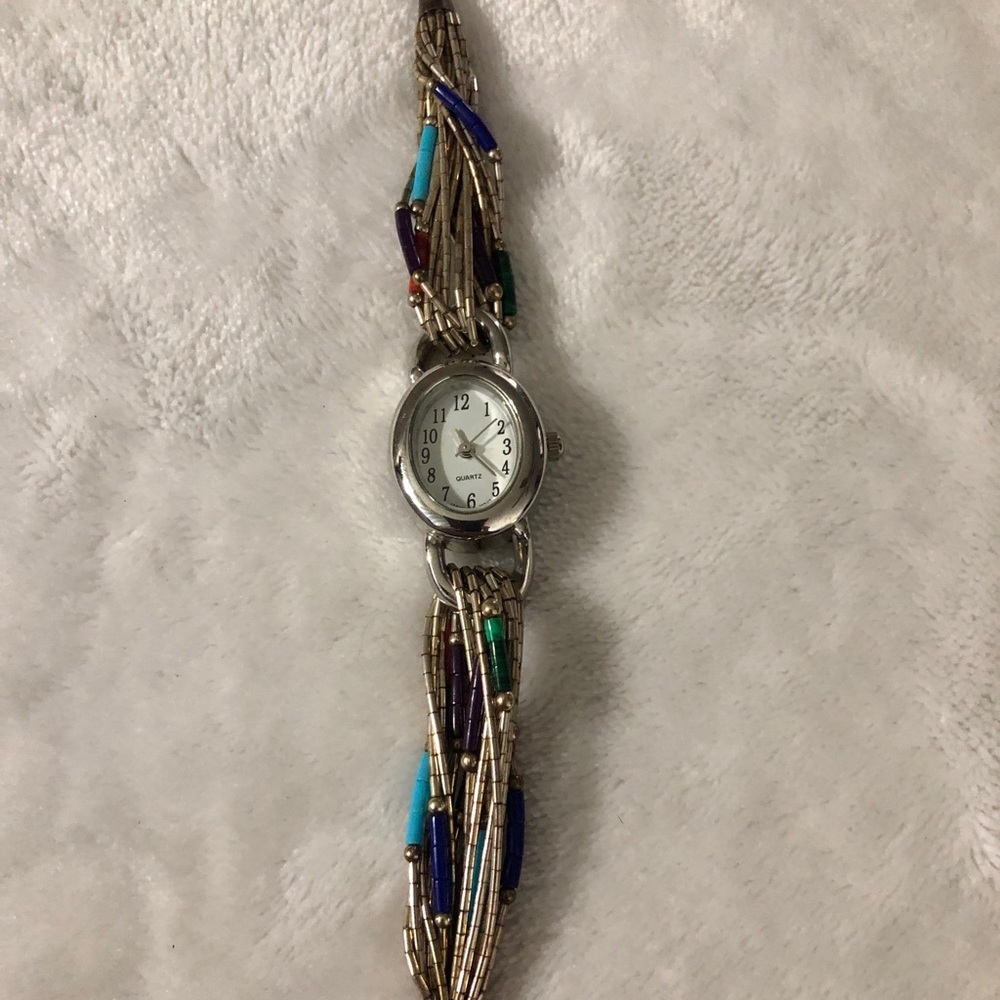 Ladies multicolored fashion watch.